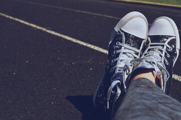 running in converse shoes